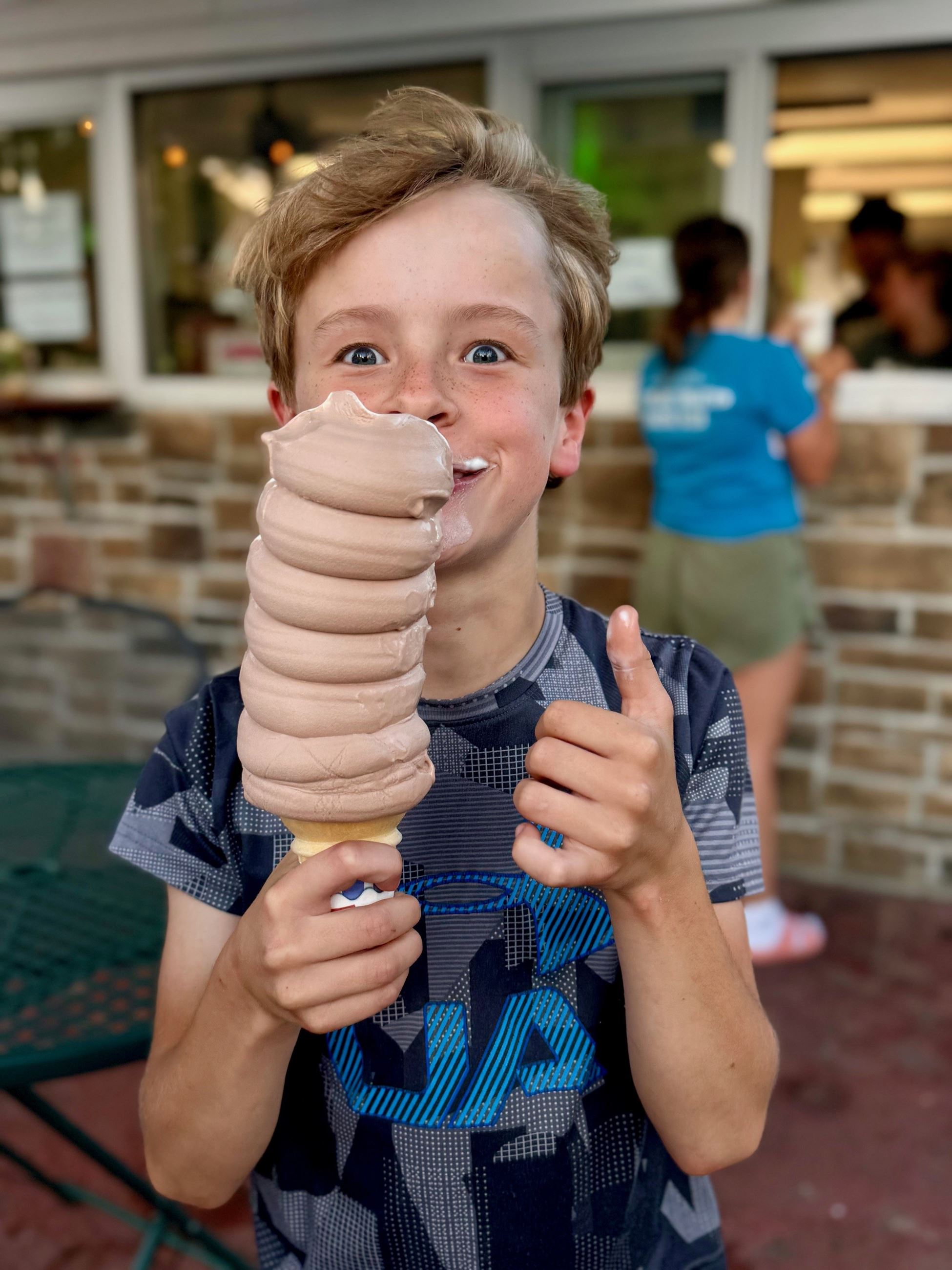 boy with large ice cream cone