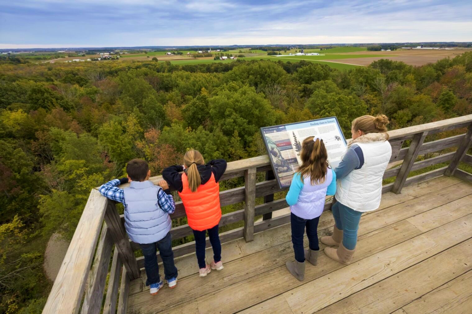 kids looking at fall colors from observation tower