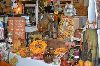 Table and display of products at Seasons by Design